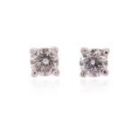 A pair of diamond stud earrings, the round brilliant-cut diamonds weigh approximately 0.30cts in
