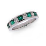 An emerald and diamond half eternity ring, channel-set with square-shaped emeralds and round