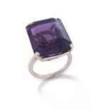 An amethyst solitaire ring, Cartier Monture, the emerald-cut amethyst is claw-set in platinum,