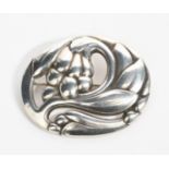 A Georg Jensen silver brooch designed by Georg Jensen, model no.65 oval pierced and cast in low