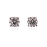 A pair of diamond stud earrings, the round brilliant-cut diamonds weigh approximately 1.00cts total,