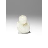 A SMALL CHINESE PALE CELADON JADE CARVING OF A BOY AND A GOOSE QING DYNASTY OR LATER The boy