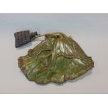 Japanese patinated bronze lily pad, with relief moulded decoration, 24cm long together with a