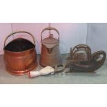 A vintage Raadvad cast iron, wooden framed, table-top hand-operated slicer, a copper and brass