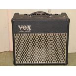 A Vox Valvetronix Amplifier model AD30VT, together with two Parabeam 300 stage lights, a pair of