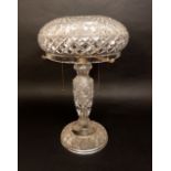 Possibly Waterford, cut glass twin branch table lamp, the domed shade over a hob nail cut column