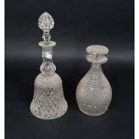 A heavy cut glass bell shaped decanter and stopper and a further Georgian decanter with geometric