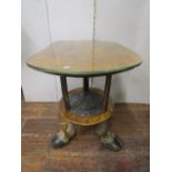 A most unusual occasional table by Roland Ward Ltd London, the two tier construction made from