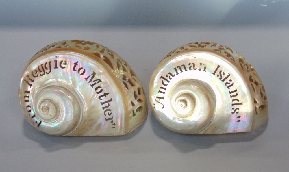 Pair of Andaman Islands pierced pearl shells, with pierced rococo details, one inscribed 'From