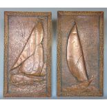 Pair of Newlyn style relief beaten copper panels, each depicting a sailing scene, within carved