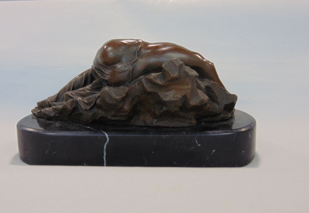 Cast bronze figure of a reclining nude on a naturalistic base, signed Milo, upon a black marble - Image 2 of 3