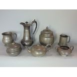 A collection of early 20th century pewter to include a Tudric square handled sucrier, interesting