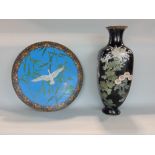 Japanese cloisonné charger decorated with a crane amidst reeds, with powder blue background, 40cm