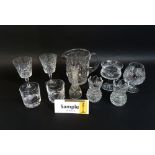 A collection of various etched cut coloured and other glassware to include a cylindrical decanter
