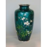 Good quality Japanese cloisonné baluster case with green guilloche enamel on silver with orchid