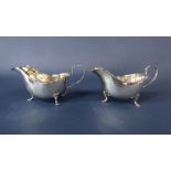 Pair of Georgian style Walker & Hall gravy boats, of typical form upon stepped square cabriole feet,