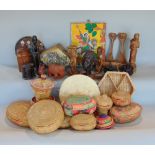 Two boxes containing a collection of Ethiopian tribal and ethnic wares to include carvings, straw