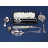 An interesting collection of antique silver spoons to include a Georgian silver caddy spoon, maker I