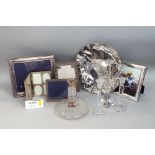 A mixed collection of glass and silver ware to include two silver applied easel frames, a silver