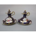 A pair of good quality early 19th century miniature Davenport ewers, covers and basins, all with