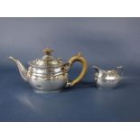 1930s Georgian style boat shaped bachelor part tea service comprising teapot and milk jug, maker