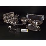 Four boxes of good quality silver plated items to include, toast racks, salts, cruet sets,