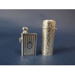 Good early 20th century silver scent bottle engraved with geometric foliage, the hinged lid