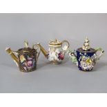 A collection of three good quality early 19th century miniature watering cans comprising a blue