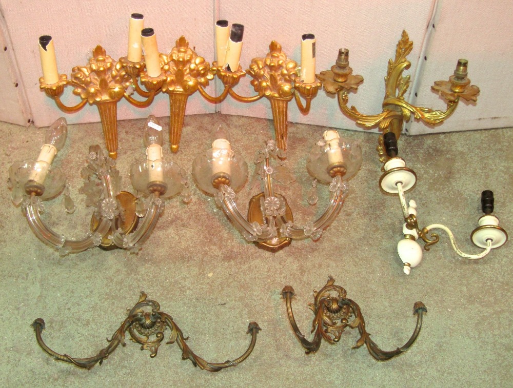 One lot of twin branch wall lights, of varying design, to include a pair of moulded glass examples