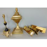 A collection of brassware to include two table lamps and a quantity of door furniture, three