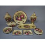 A collection of Aynsley Orchard Gold pattern wares comprising a pair of two handled vases and