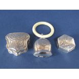 Victorian style silver serpentine pill box, the hinged lid engraved with scrolled foliage, with a