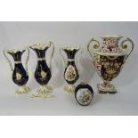 A 19th century Derby two handled vase with Imari type painted and gilded decoration and painted mark