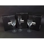 Three boxed pairs of John Rocha Waterford crystal goblets, comprising four wine glasses and two