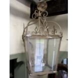 A contemporary Georgian style hanging porch or hall lantern of square tapered form, with glazed