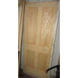 A Georgian style four panel pine interior door, plastic wrapped, never installed, 198 x 85cm approx