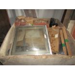 A ply wood bin containing a miscellaneous collection of quarry tiles, roof light (unused) floor