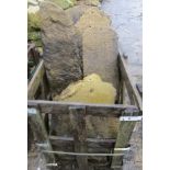 A crate of reconstituted Cotswold stone style tiles