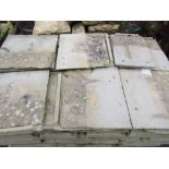 A pallet of weathered concrete tiles 36 cm x 40 cm approx