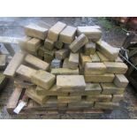 A pallet of reconstituted building stones, various sizes, approx 3 square metres
