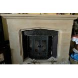 A reconstituted Tudor style fire surround in sections, max width 170cm