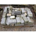 A pallet of granite cobs