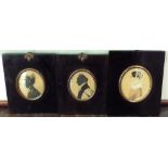 Two early 19th century silhouette profile portrait miniatures, both of oval form, one showing a lady