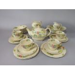 A collection of Royal Doulton Minden pattern wares number D5334 comprising teapot, cake plate,