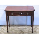 A 19th century mahogany bow-fronted side table fitted with a shallow frieze drawer with oak