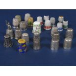 A large collection of various thimbles to include silver examples by Charles Horner (a collection)