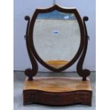 A small Georgian mahogany shield shaped toilet mirror, with crossbanded and inlaid detail,