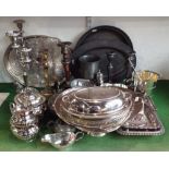 A large collection of various silver plated wares to include a five branch silver plated candelabra,