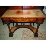A 19th century mahogany side table fitted with a frieze drawer raised on turned column supports,