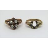 Two Victorian 9ct rings; an ornate split pearl and garnet cluster ring, size O/P and a horseshoe